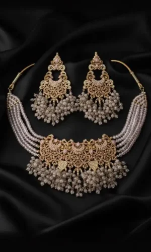 elegant indian bridal jewelry set in gold and pink perfect for weddings parties and other special occasions code bp3l25