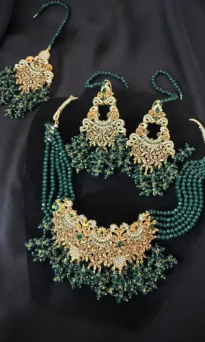 majestic green beaded bridal jewelry set with gold & kundan detailing featuring earrings necklace and tika for traditional wear code eg3l25